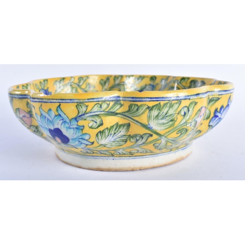 1270 - AN UNUSUAL 19TH CENTURY MIDDLE EASTERN IZNIK POTTERY BOWL painted with typical scrolling foliage upo... 