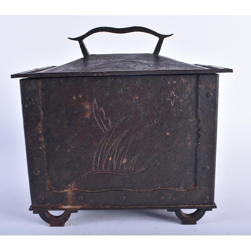 1275 - A LARGE ANTIQUE GERMAN IRON ENGRAVED TABLE CASKET decorated with sparse foliage in the Medieval mann... 