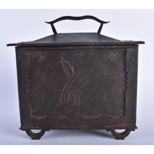 1275 - A LARGE ANTIQUE GERMAN IRON ENGRAVED TABLE CASKET decorated with sparse foliage in the Medieval mann... 