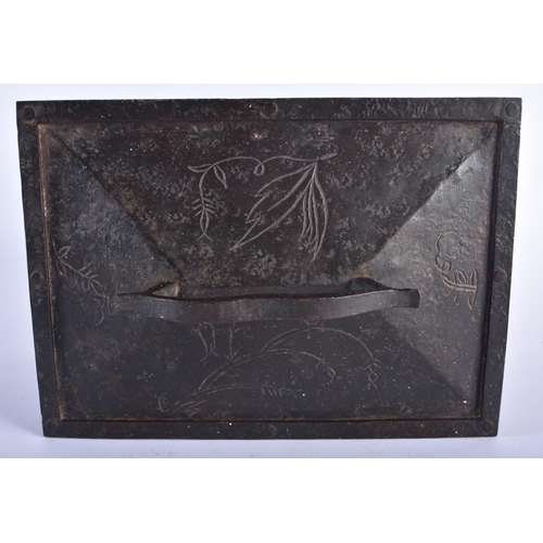 1275 - A LARGE ANTIQUE GERMAN IRON ENGRAVED TABLE CASKET decorated with sparse foliage in the Medieval mann... 