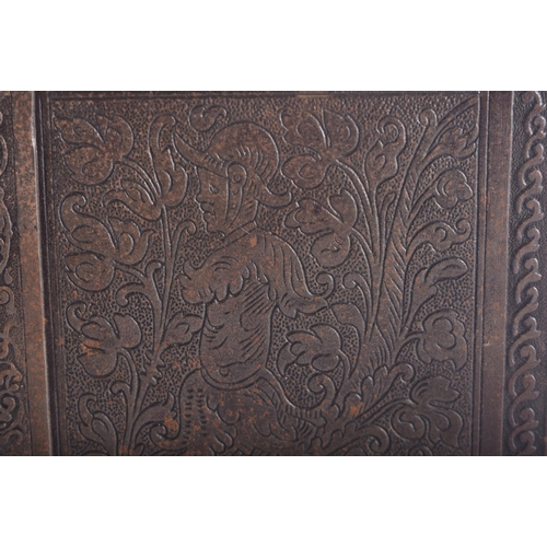 1276 - AN ANTIQUE GERMAN IRON ENGRAVED TABLE CASKET decorated with stylised figures amongst foliage in the ... 