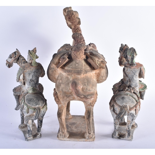 1279 - A RARE EARLY CHINESE TANG DYNASTY POTTERY FIGURE OF A CAMEL carrying saddle bags in the form of grot... 