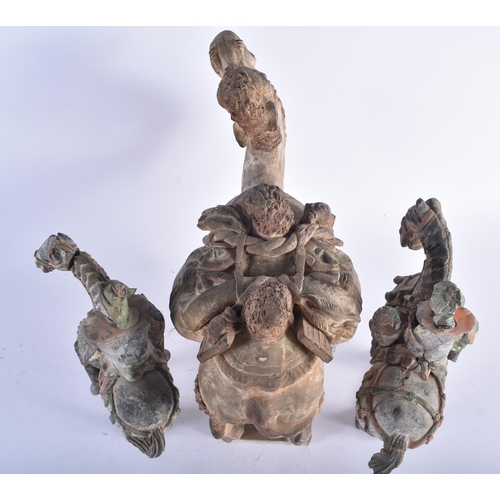 1279 - A RARE EARLY CHINESE TANG DYNASTY POTTERY FIGURE OF A CAMEL carrying saddle bags in the form of grot... 