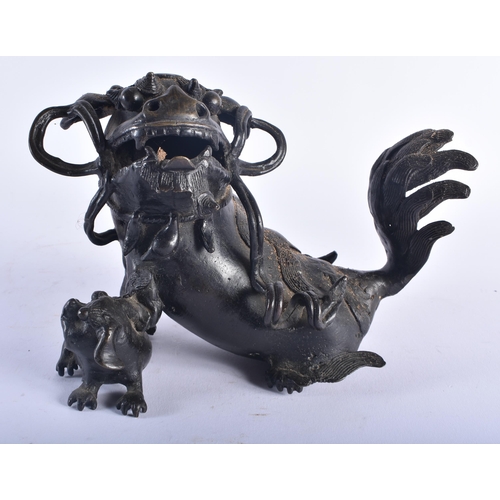 1283 - A 17TH CENTURY CHINESE BRONZE FIGURE OF A DOG OF FOE Ming, possibly an incense burner. 20 cm x 16 cm... 