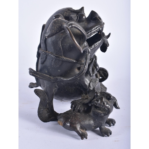 1283 - A 17TH CENTURY CHINESE BRONZE FIGURE OF A DOG OF FOE Ming, possibly an incense burner. 20 cm x 16 cm... 