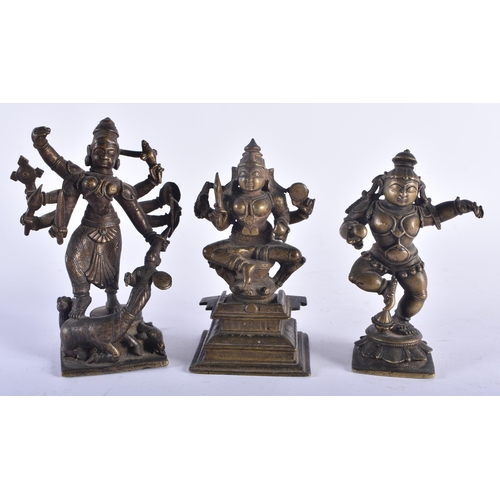 1284 - THREE 17TH/18TH CENTURY INDIAN BRONZE HINDU DEITIES including a multi armed figure pulling the head ... 