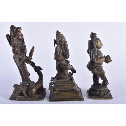 1284 - THREE 17TH/18TH CENTURY INDIAN BRONZE HINDU DEITIES including a multi armed figure pulling the head ... 