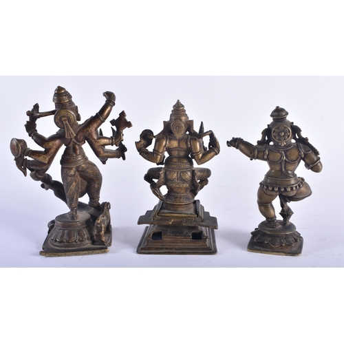 1284 - THREE 17TH/18TH CENTURY INDIAN BRONZE HINDU DEITIES including a multi armed figure pulling the head ... 