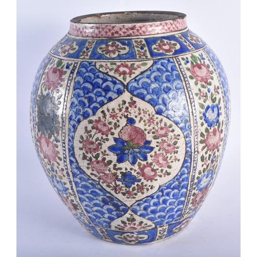 1288 - A LARGE 18TH CENTURY PERSIAN OVOID POTTERY VASE painted with Islamic style floral sprays, under a bl... 