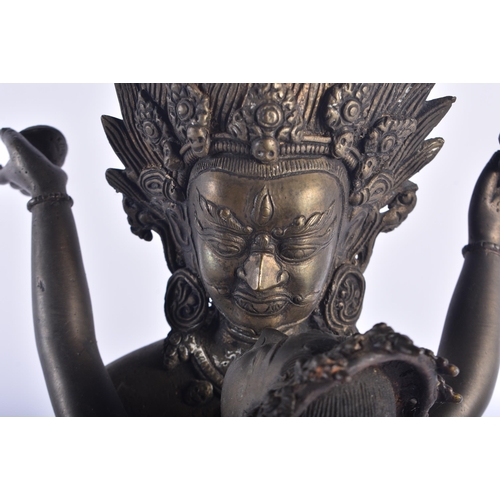 1291 - A LARGE LATE 19TH CENTURY INDIAN HINDU BRONZE EROTIC BUDDHA modelled as a male wearing a flaming hea... 