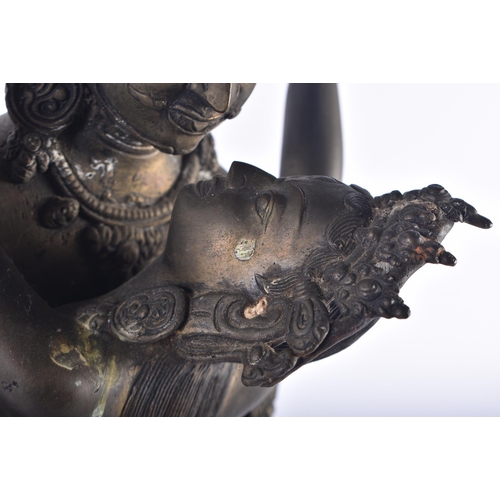 1291 - A LARGE LATE 19TH CENTURY INDIAN HINDU BRONZE EROTIC BUDDHA modelled as a male wearing a flaming hea... 