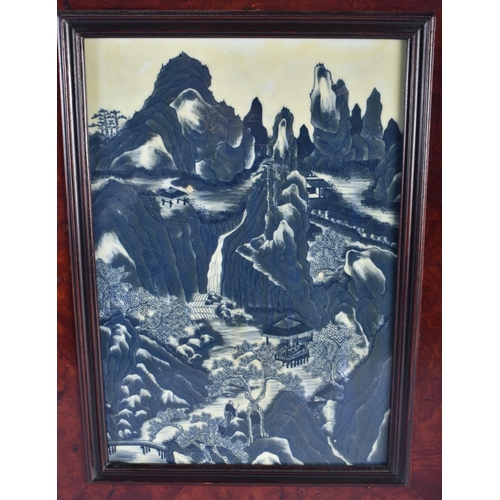 1293 - A LARGE EARLY 19TH CENTURY CHINESE BLUE AND WHITE PORCELAIN PLAQUE Qing, within a heavy burr wood fr... 