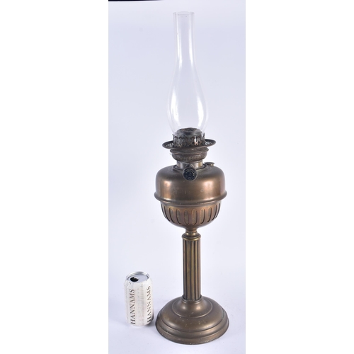 1294 - AN ANTIQUE BRASS OIL LAMP. 66 cm high.