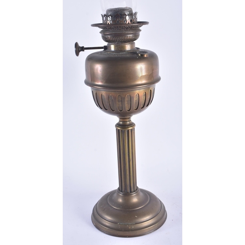 1294 - AN ANTIQUE BRASS OIL LAMP. 66 cm high.