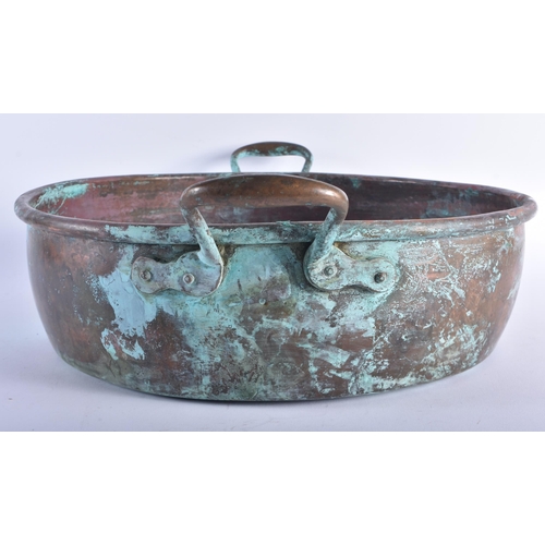 1295 - AN ANTIQUE COPPER JAM PAN. 52 cm wide.