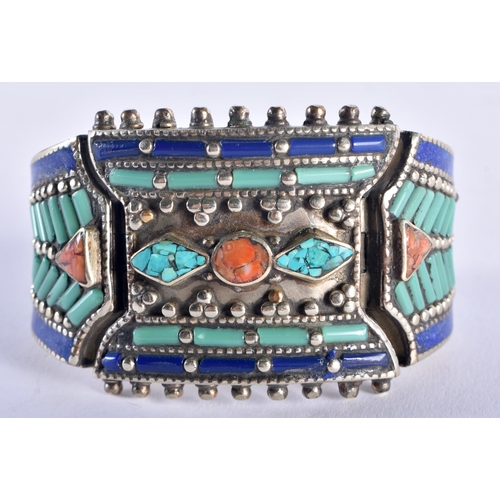 1324 - A TIBETAN SILVER CORAL AND TURQUOISE BRACELET. 173 grams. 16 cm long.