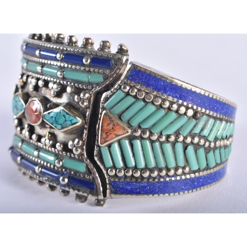 1324 - A TIBETAN SILVER CORAL AND TURQUOISE BRACELET. 173 grams. 16 cm long.