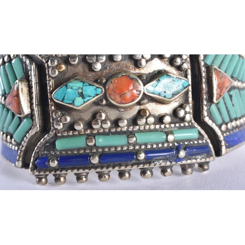 1324 - A TIBETAN SILVER CORAL AND TURQUOISE BRACELET. 173 grams. 16 cm long.