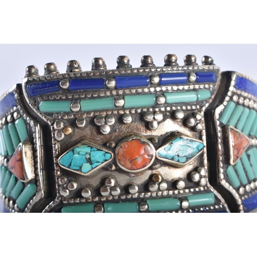 1324 - A TIBETAN SILVER CORAL AND TURQUOISE BRACELET. 173 grams. 16 cm long.