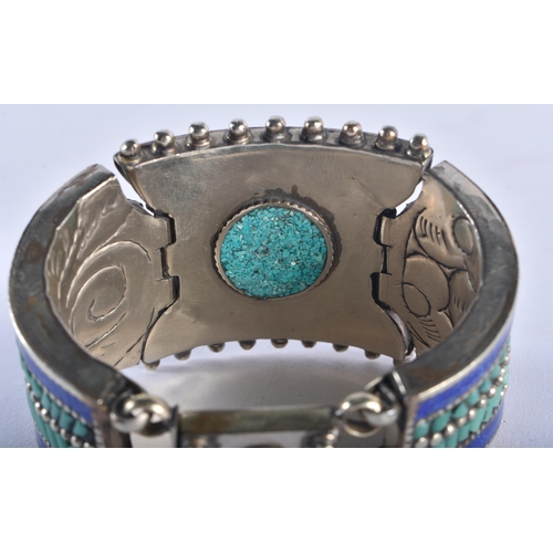 1324 - A TIBETAN SILVER CORAL AND TURQUOISE BRACELET. 173 grams. 16 cm long.