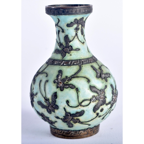 1327 - AN EARLY 20TH CENTURY CHINESE WHITE METAL AND ENAMEL VASE Late Qing/Republic. 66 grams. 9 cm high.