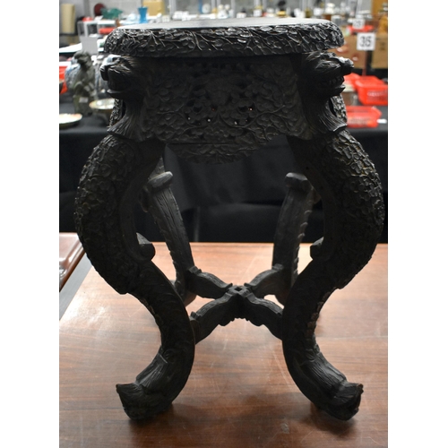 1330 - A 19TH CENTURY BURMESE ANGLO INDIAN CARVED WOOD STAND. 57 cm x 30 cm.