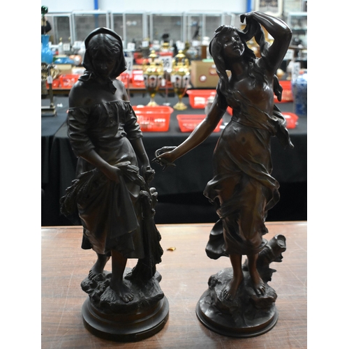 1341 - A LARGE MATCHED PAIR OF ANTIQUE FRENCH BRONZES OF FEMALES. Largest 58 cm high.