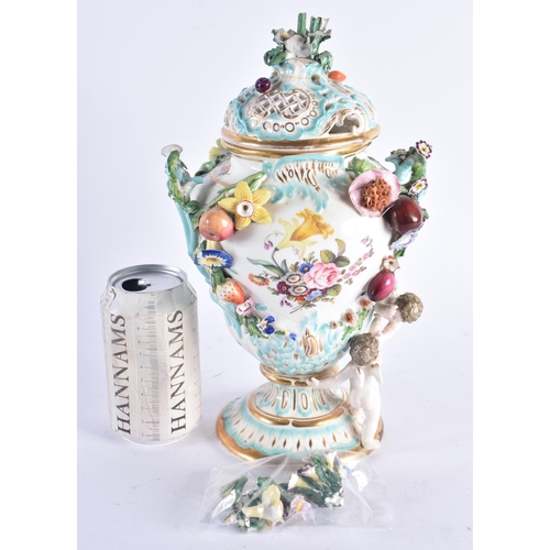 1349 - AN EARLY 19TH CENTURY CONTINENTAL POT POURRI AND COVER painted with flowers. 30 cm high.