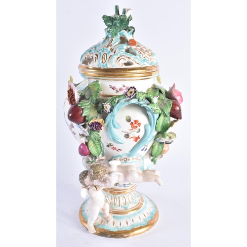 1349 - AN EARLY 19TH CENTURY CONTINENTAL POT POURRI AND COVER painted with flowers. 30 cm high.