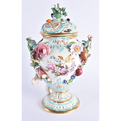 1349 - AN EARLY 19TH CENTURY CONTINENTAL POT POURRI AND COVER painted with flowers. 30 cm high.