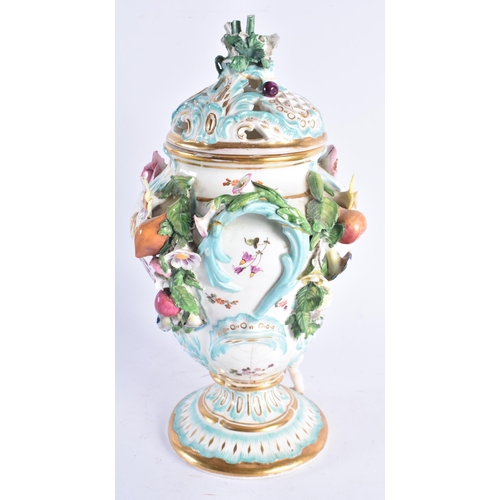 1349 - AN EARLY 19TH CENTURY CONTINENTAL POT POURRI AND COVER painted with flowers. 30 cm high.