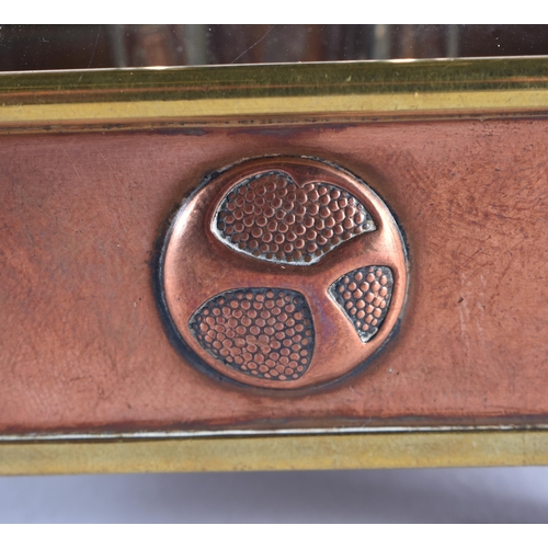 1350 - A FINE ARTS AND CRAFTS COPPER BRASS AND ENAMEL INKWELL of organic form. 7.75 cm square.