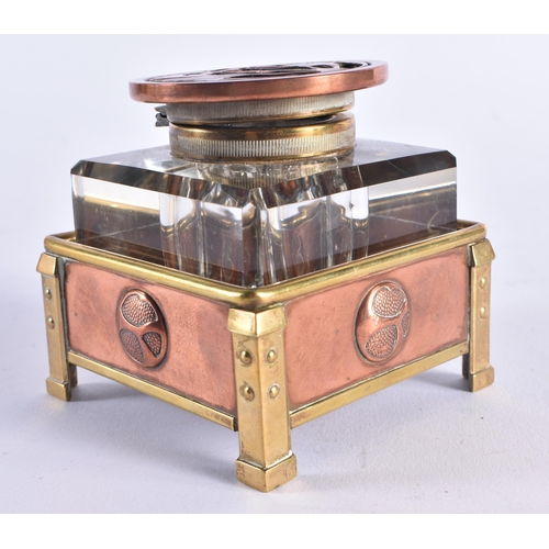 1350 - A FINE ARTS AND CRAFTS COPPER BRASS AND ENAMEL INKWELL of organic form. 7.75 cm square.