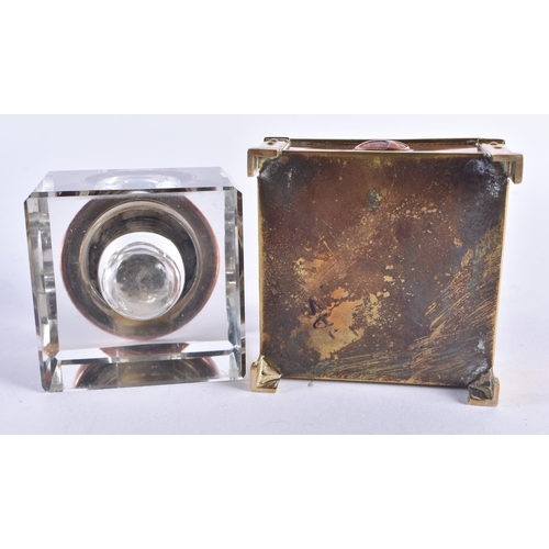 1350 - A FINE ARTS AND CRAFTS COPPER BRASS AND ENAMEL INKWELL of organic form. 7.75 cm square.