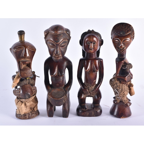 1368 - FOUR AFRICAN CARVED WOOD TRIBAL FIGURES. Largest 24 cm high. (4)