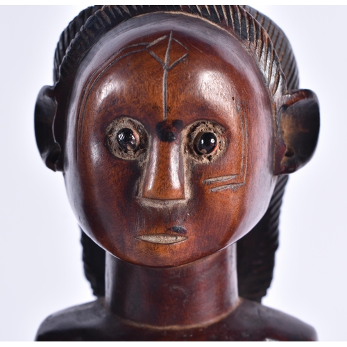 1368 - FOUR AFRICAN CARVED WOOD TRIBAL FIGURES. Largest 24 cm high. (4)