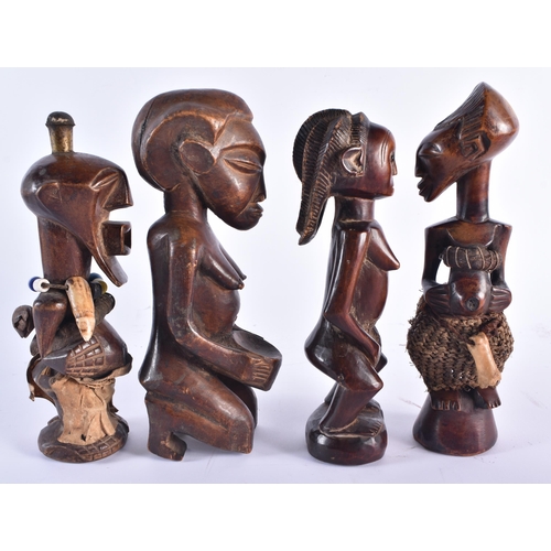 1368 - FOUR AFRICAN CARVED WOOD TRIBAL FIGURES. Largest 24 cm high. (4)