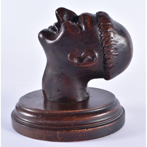 1377 - AN ANTIQUE CONTINENTAL TREEN CARVED WOOD COAT HANGER together with a Victorian mahogany money box. L... 