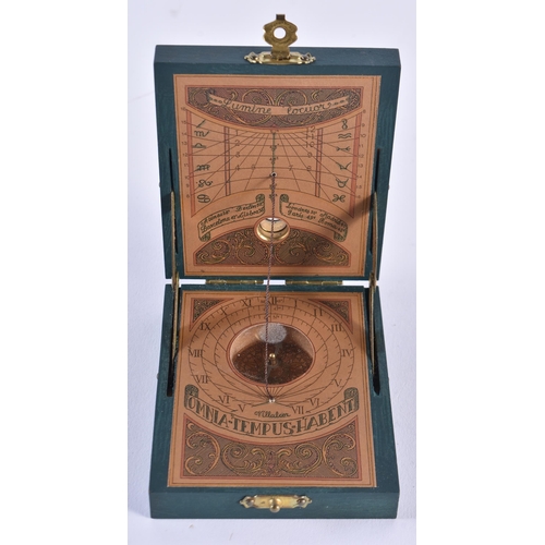 1383 - A VINTAGE WOOD CSED BRASS SUNDIAL POCKET COMPASS. 8.5 cm x 7 cm.