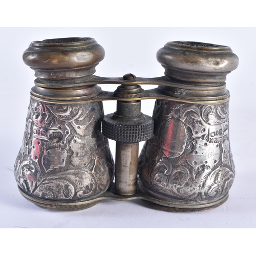 1400 - A PAIR OF VICTORIAN SILVER OPERA GLASSES together with a silver rhinoceros bottle stopper. Largest 9... 