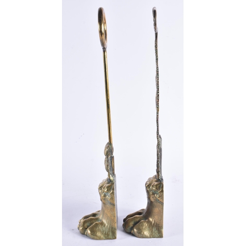 1410 - A MATCHED PAIR OF EARLY 19TH CENTURY ENGLISH COUNTRY HOUSE BRONZE DOOR STOPS formed as finely cast l... 