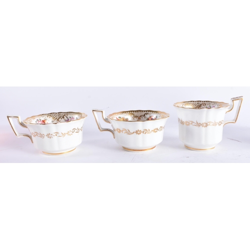 1414 - A PAIR OF EARLY 19TH CENTURY COALPORT PORCELAIN CUPS AND SAUCERS together with another matching cup ... 