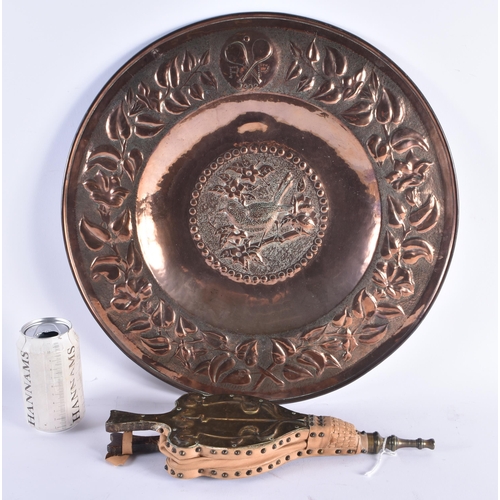 1419 - A LARGE ARTS AND CRAFTS COPPER REPOUSSE WALL CHARGER signed PP, together with a pair of Art Nouveau ... 