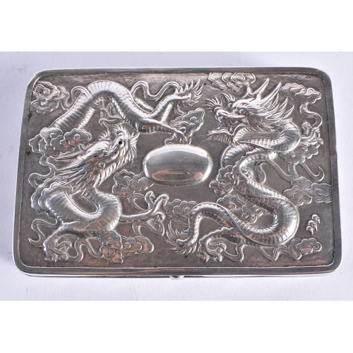 1446 - A 19TH CENTURY CHINESE EXPORT SILVER DRAGON BOX stamped WHL, depicting dragons in relief amongst clo... 