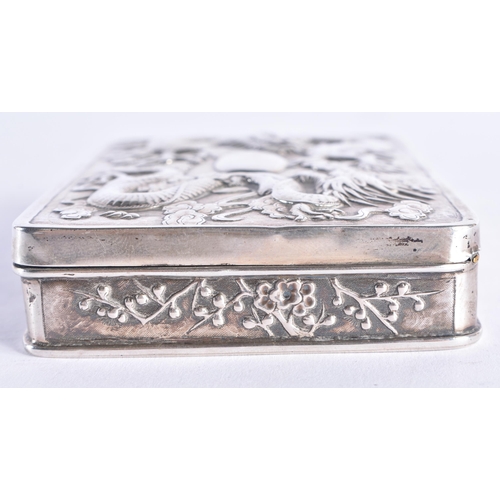 1446 - A 19TH CENTURY CHINESE EXPORT SILVER DRAGON BOX stamped WHL, depicting dragons in relief amongst clo... 