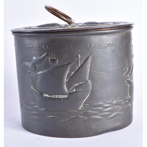 1448 - AN UNUSUAL ARTS AND CRAFTS NEWLYN COPPER TEA CADDY AND COVER decorated in relief with boats at full ... 