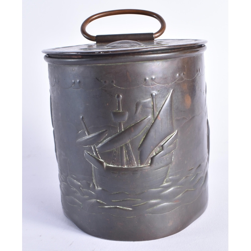 1448 - AN UNUSUAL ARTS AND CRAFTS NEWLYN COPPER TEA CADDY AND COVER decorated in relief with boats at full ... 