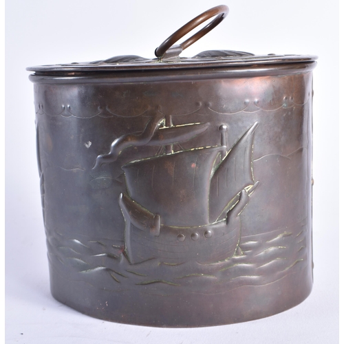 1448 - AN UNUSUAL ARTS AND CRAFTS NEWLYN COPPER TEA CADDY AND COVER decorated in relief with boats at full ... 