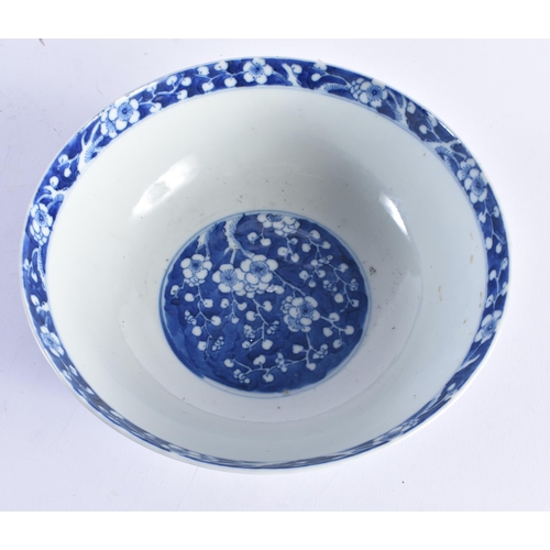 1451 - A 19TH CENTURY CHINESE BLUE AND WHITE PORCELAIN BOWL Qing, painted with prunus and flowers. 20 cm di... 