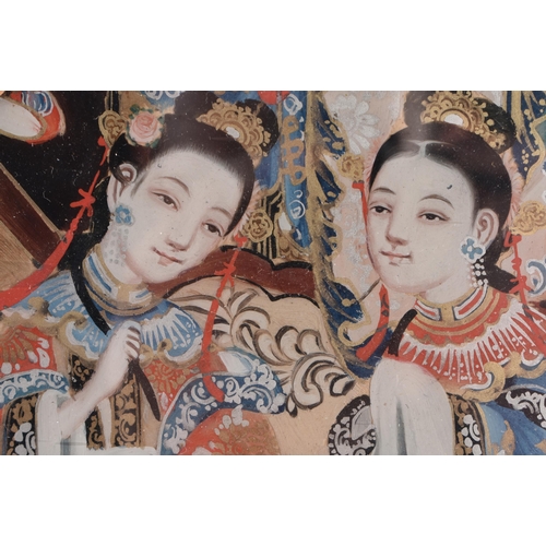 1457 - A PAIR OF 18TH CENTURY CHINESE REVERSE PAINTED PLAQUES Late Qianlong, depicting beauties within a la... 